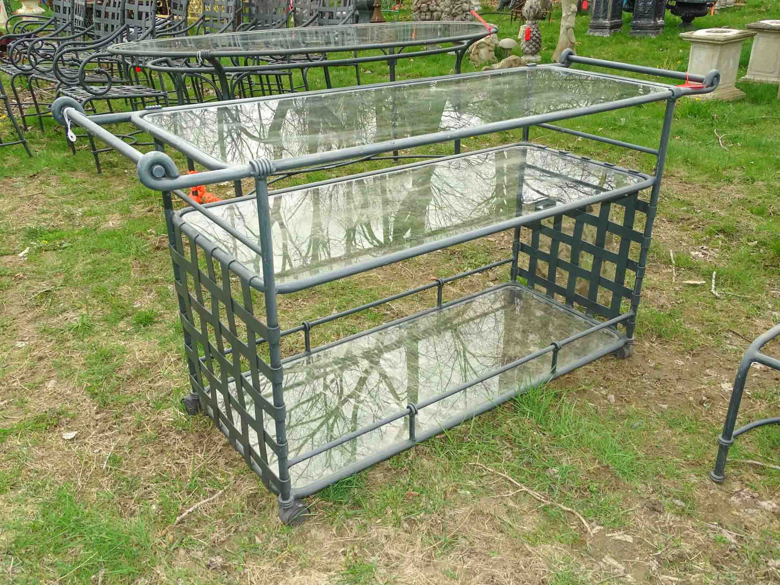 Brown Jordan Patio Trolley: Brown Jordan glass top patio tea trolley. 59" L x 20" W. x 31" Ht.. Barbara Packer Collection.