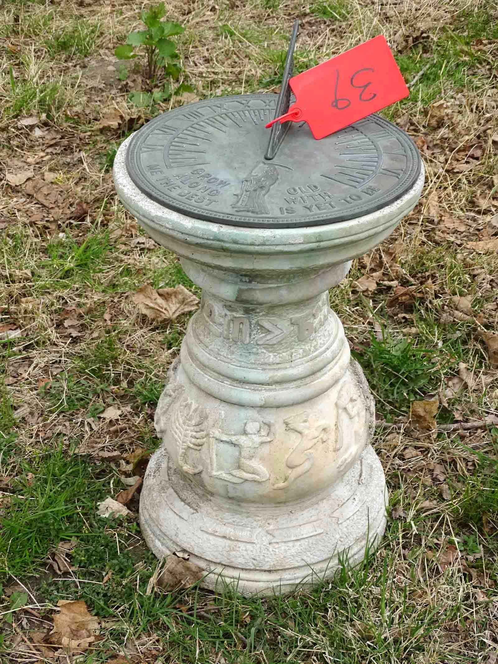 Sundial: Sundial with cast base and bronze dial. 18". Barbara Packer Collection.