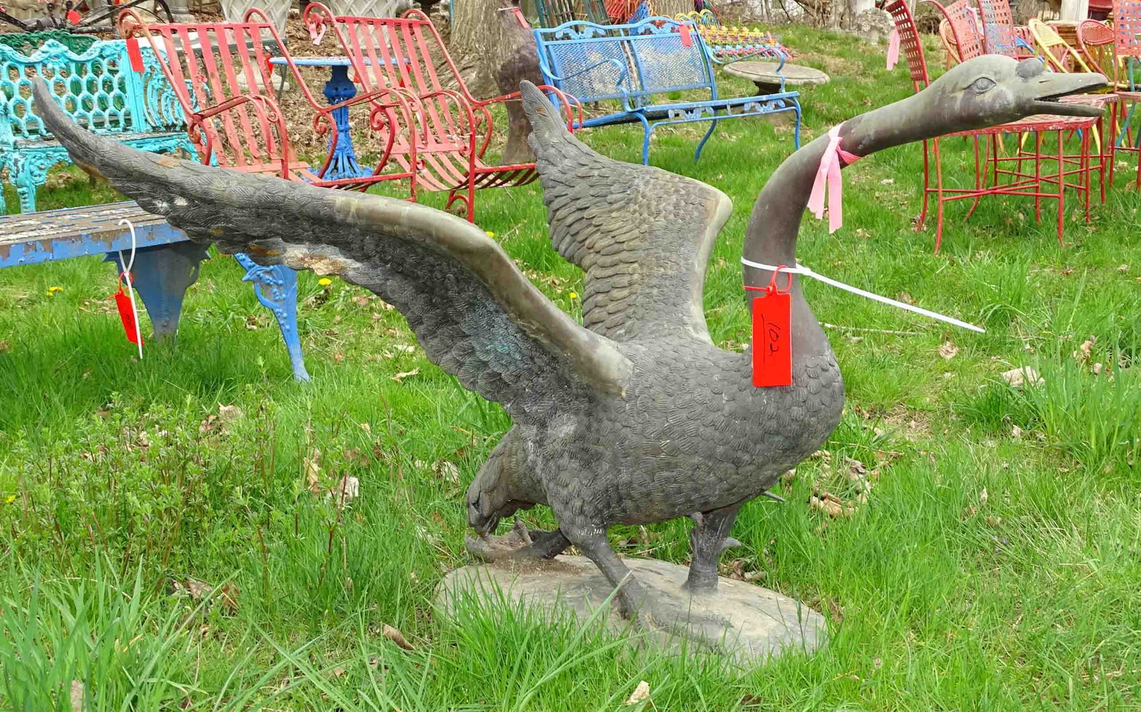 Metal Goose Statue: Metal goose statue. 38" W. x 50" L. x 29" Ht.. Barbara Packer Collection.