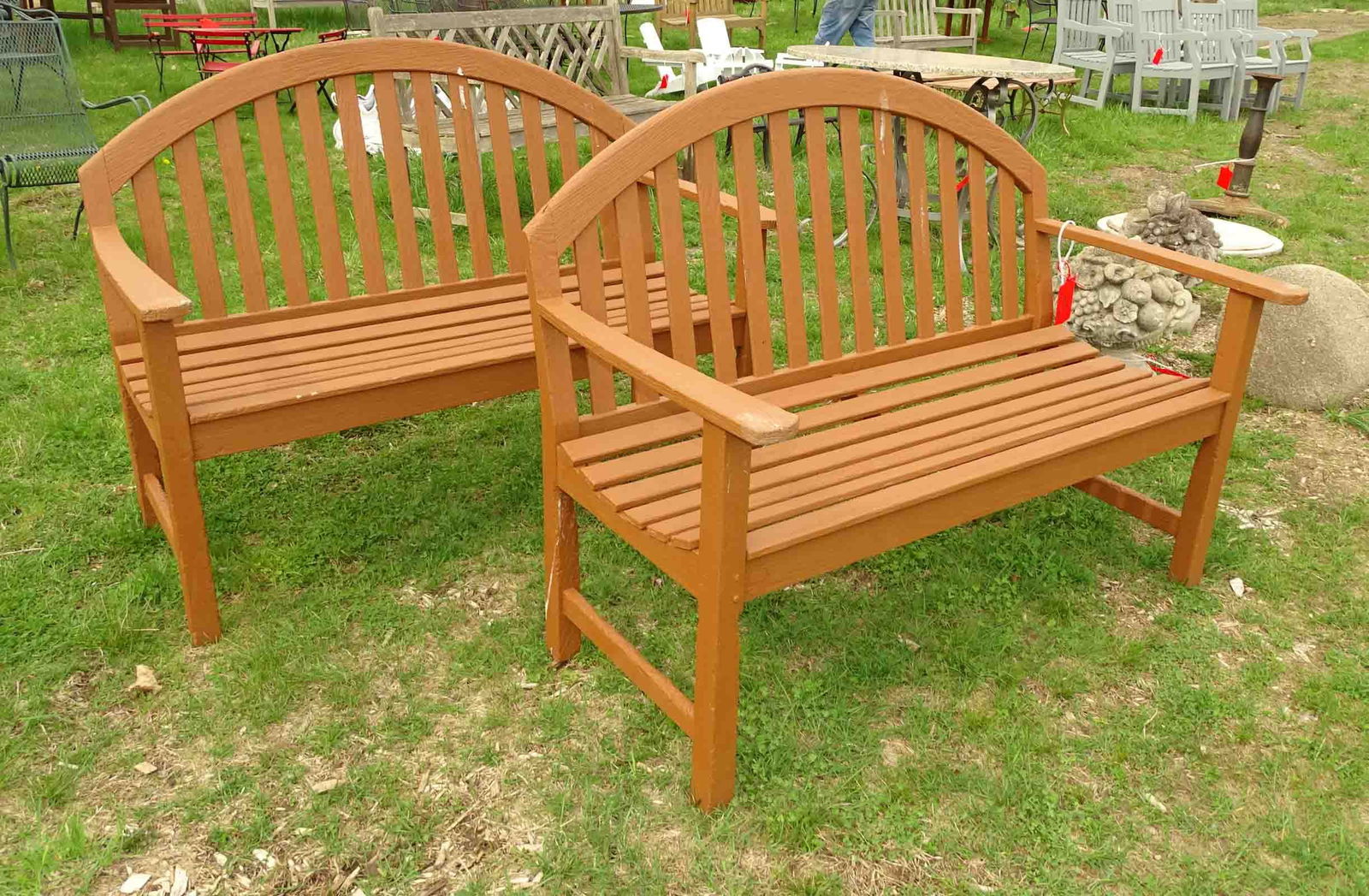 Pair of Teak Settees: Pair of teak arch back settees. 48" W. x 37" Ht..