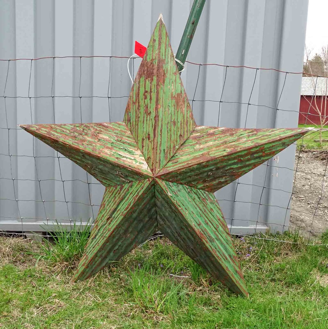 Tin Star: Tin star decorative ornament 56".