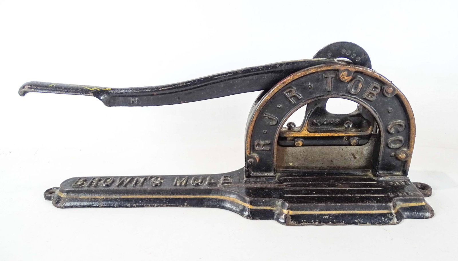 19th c. Cast Iron Tobacco Cutter: 19th c. cast irons "BROWNS MULE TOBACCO" cutter. 18" L., 7" Ht..