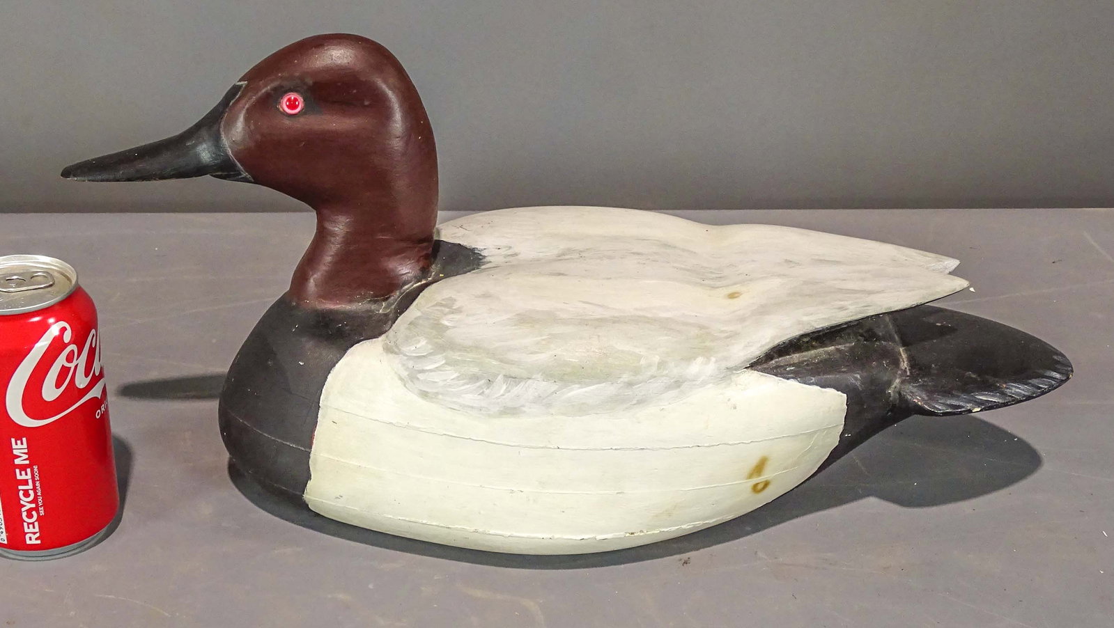 Decoy: Carved wooden decoy signed "S.F. Morien 2/8/87". 17" L..