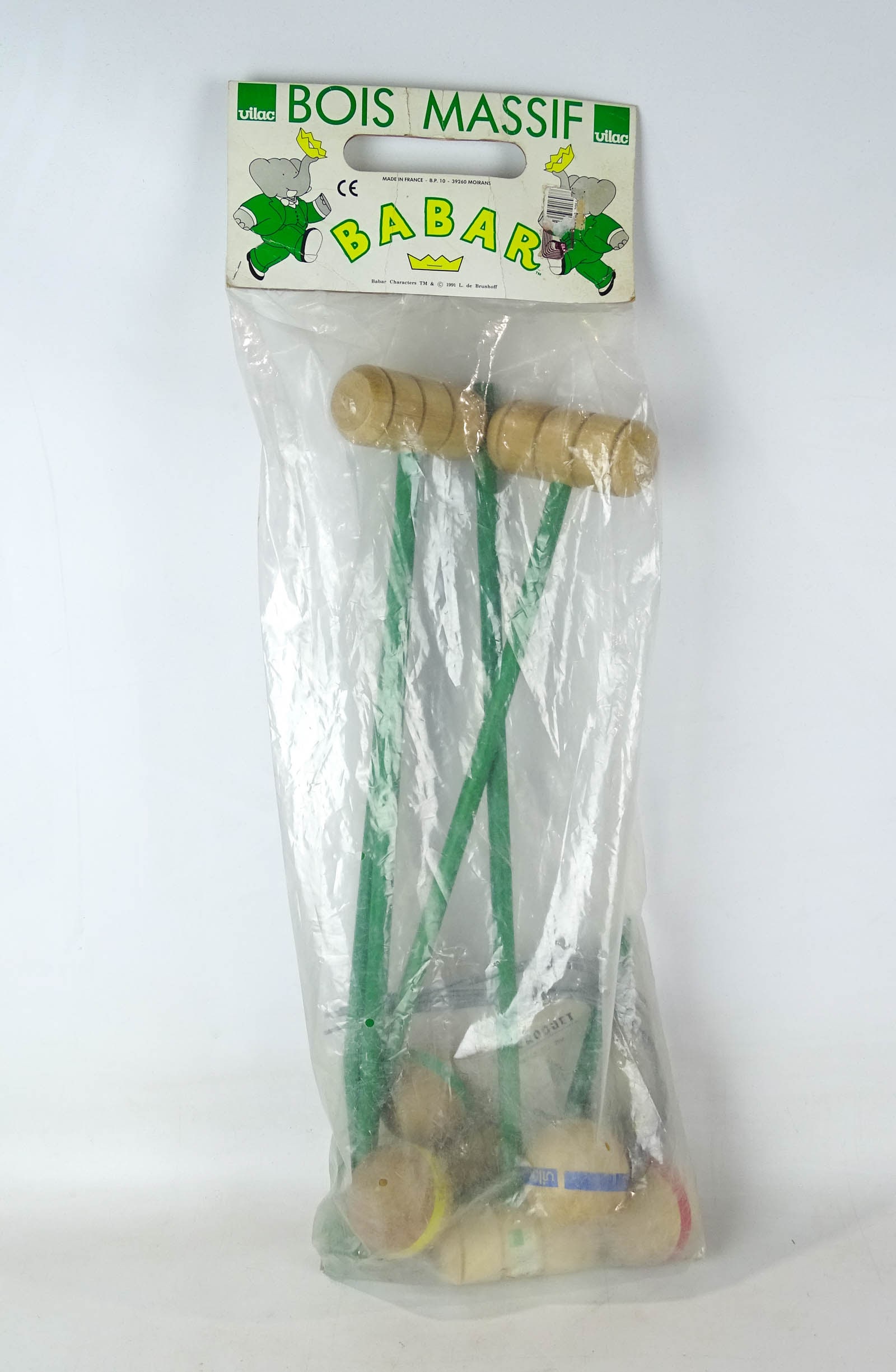 Babar the Elephant Croquet Set: French set of croquet mallets, balls, and wickets marketed as a Babar the elephant children's toy. L. de Brunhoff, 1991.