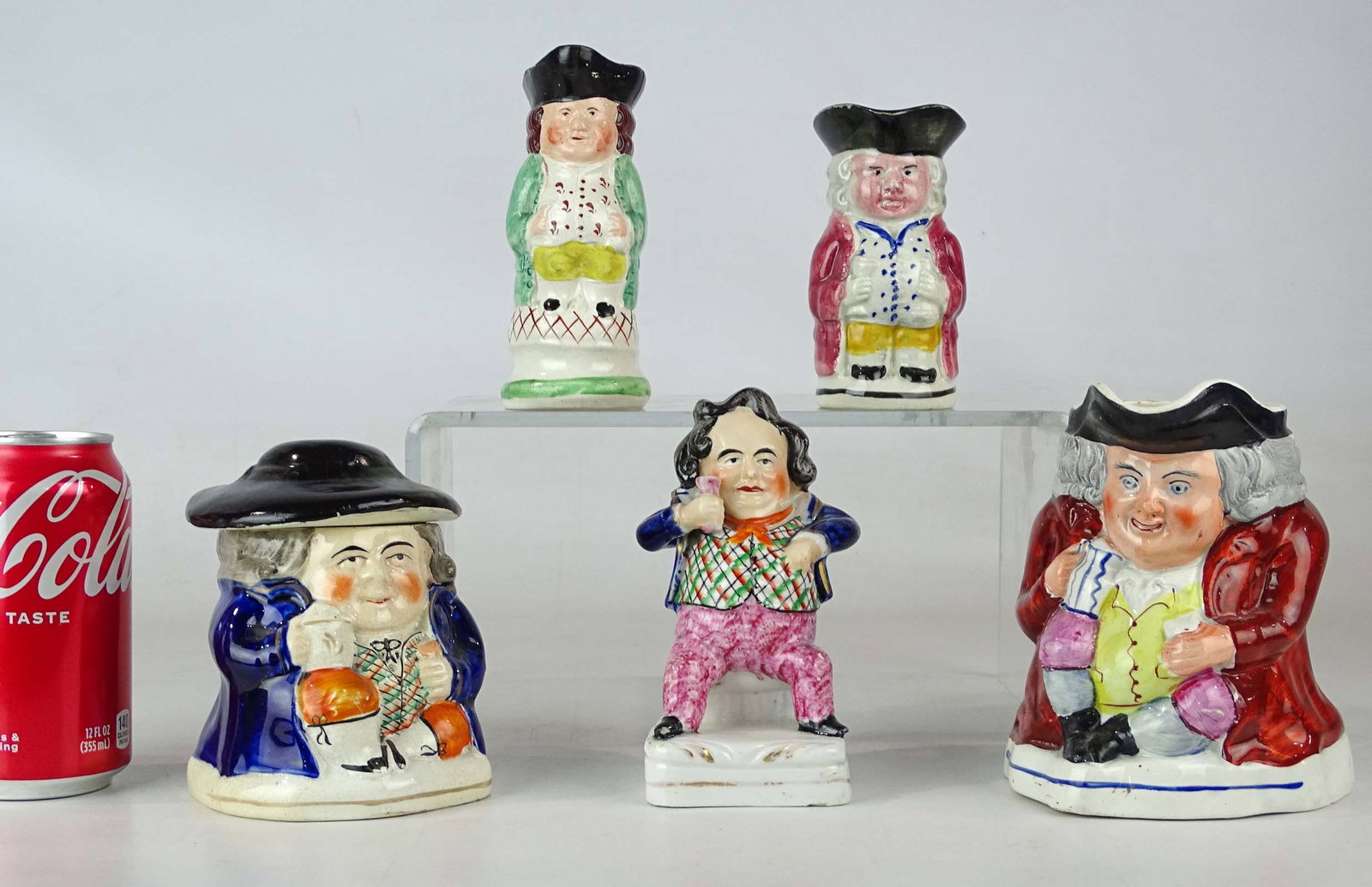 Toby Jugs: Lot (3) early Toby mugs (5 1/2" Ht.), covered toby (4 1/2" Ht.), figurine (5 1/2" Ht.).
