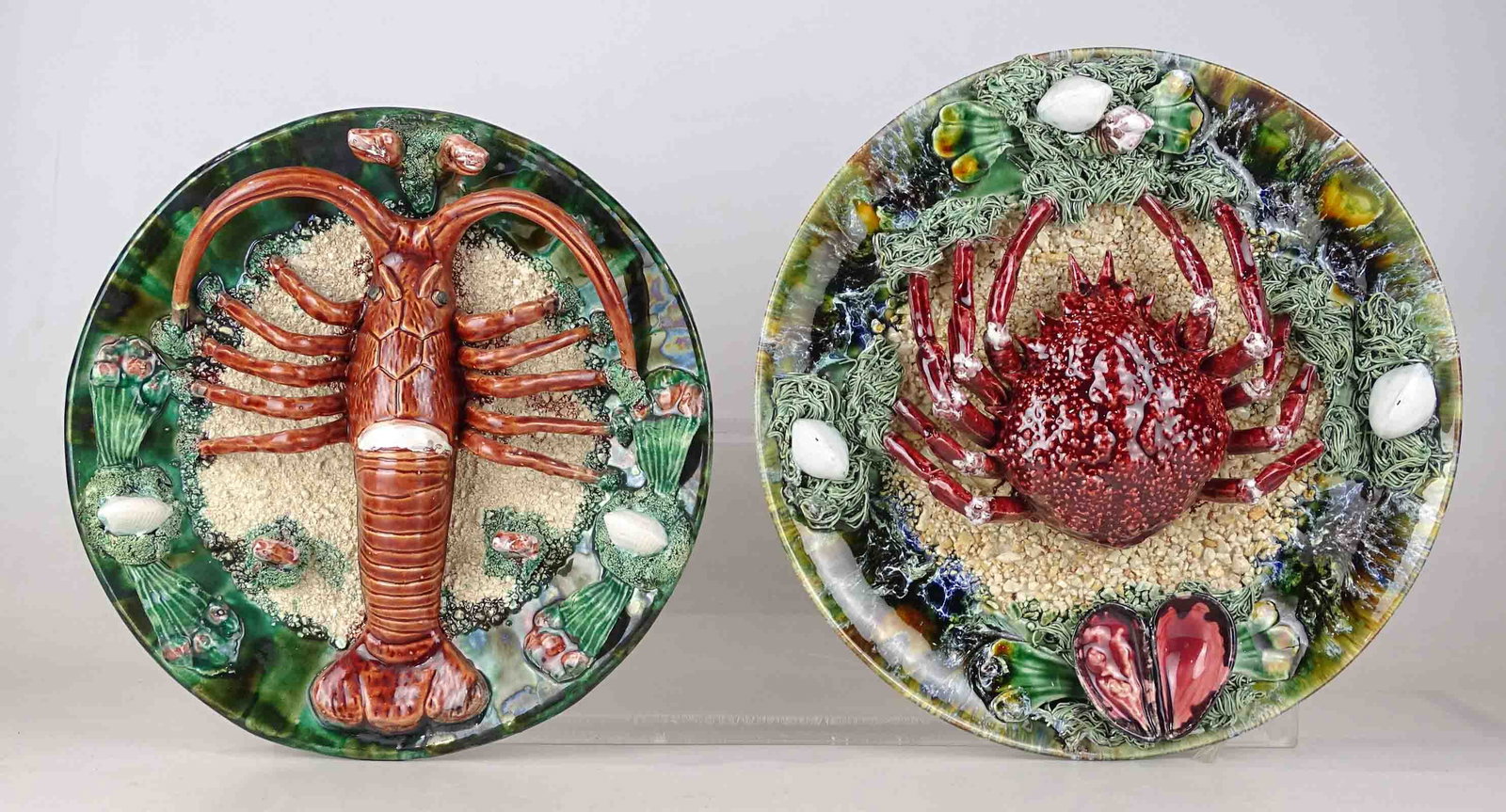 Pair of Majolica Plates: Pair of Majolica Crustacean Plates. 12" D., lobster repaired.