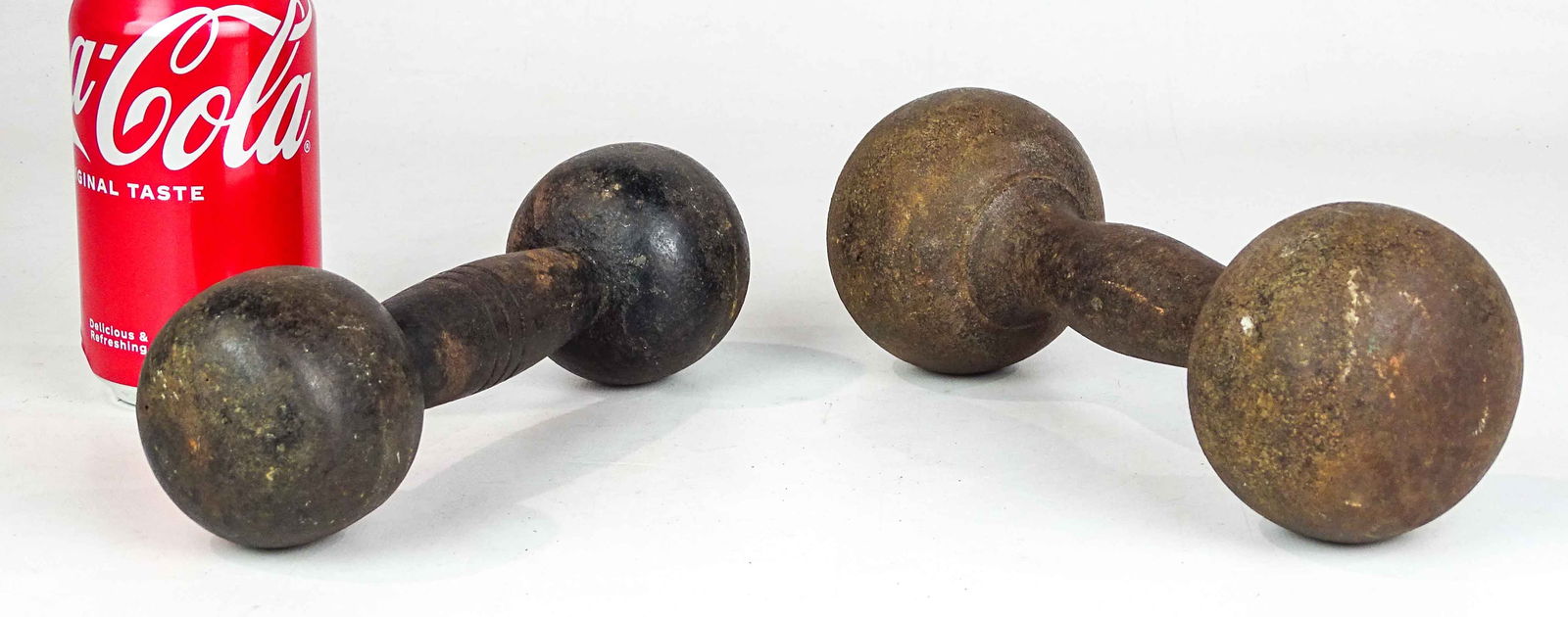 Pair Iron Dumbells: Pair of early iron dumbells.