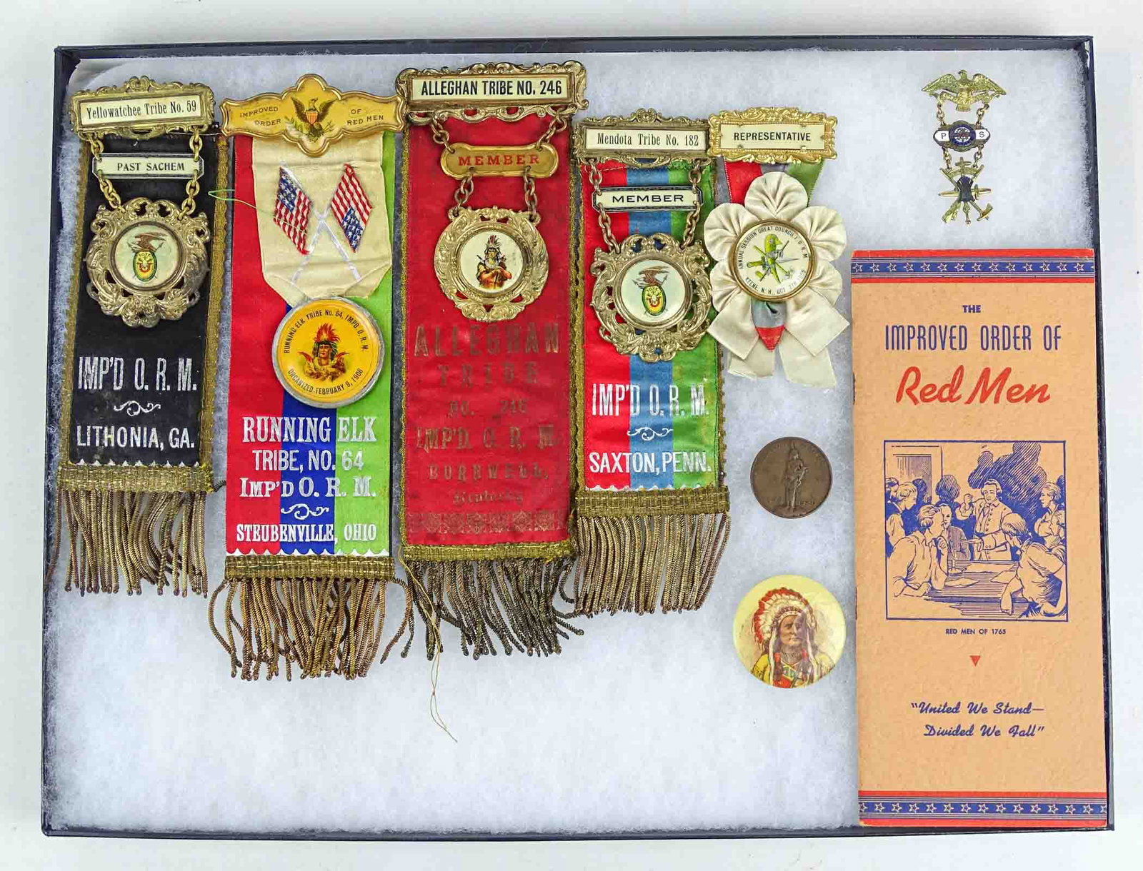 Improved Order of the Red Men Lot: Lot of vintage Improved Order of the Red Men pins and ribbons. Case included.