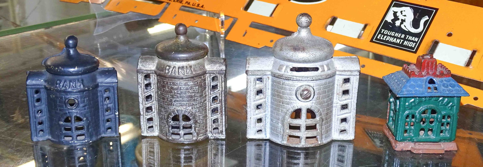 Bank Lot: Lot (4) 19th c. cast iron building banks. Tallest 4" Ht.. One slightly loose.