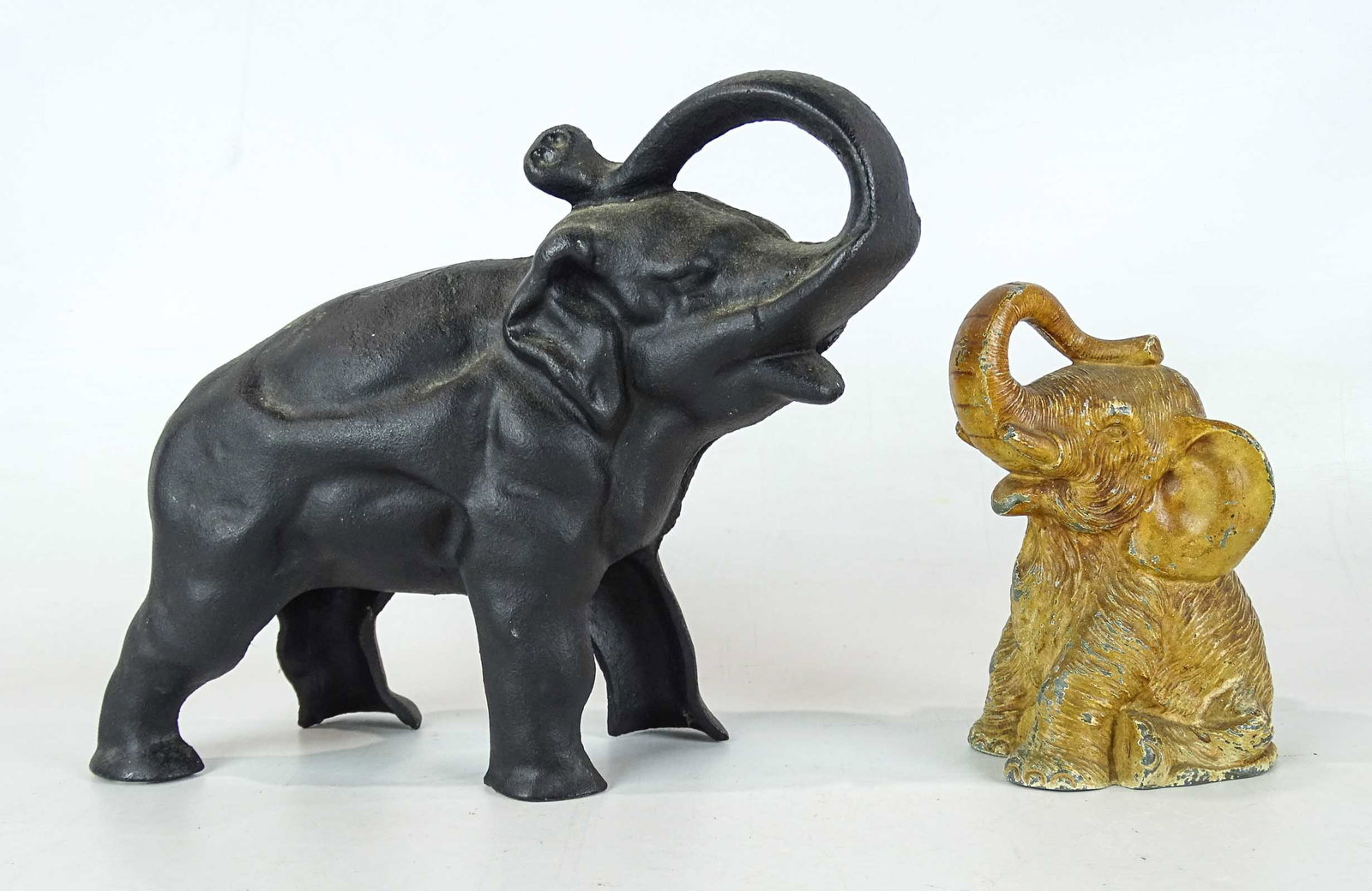 Bank Lot: Lot including cast iron elephant bank (7" Ht.), and elephant bank (5 1/2" Ht.).