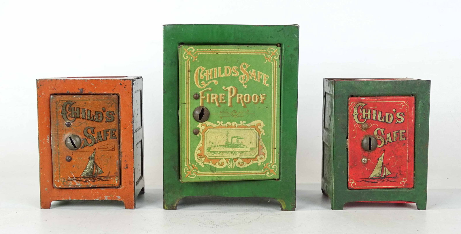 Bank Lot: Lot (3) ti litho child's safe banks. Tallest 5 1/2" Ht..