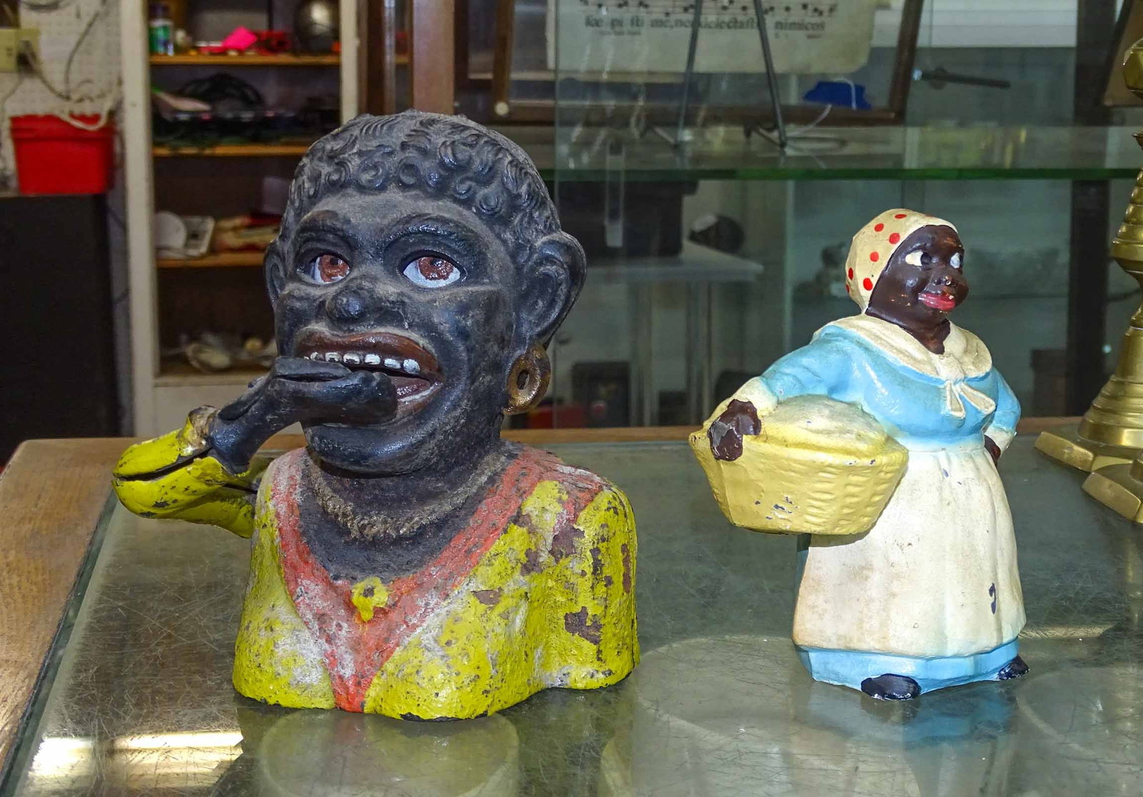Bank Lot: Lot including cast iron Dinah mechanical bank (7 1/2" Ht.), cast metal Mammy bank (5 3/4" Ht.).