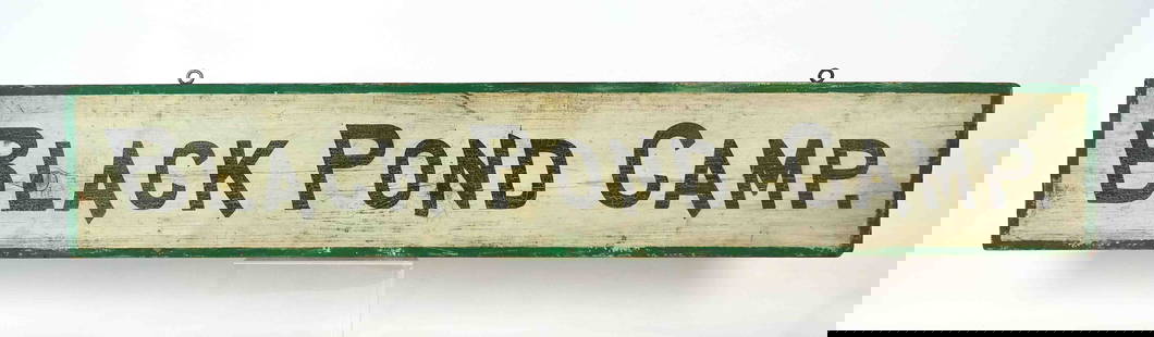 Trade Sign: Early painted wooden trade sign "BLACK POND CAMP.". 7 1/2" x 42".