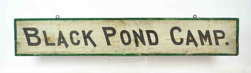 Trade Sign: Early painted wooden trade sign "BLACK POND CAMP.". 7 1/2" x 42".