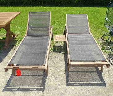 Pair Wooden Chaise Lounges: Pair of wooden adjustable chaise lounges with pull out leaves. 75" L. x 25" W. x 13 3/4" Ht..