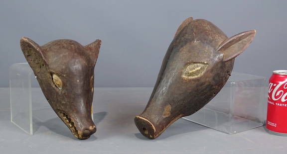 African Masks: Two African wooden Makonde pig masks. Largest 12" L..