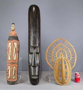 Mask Lot: Lot including New Guinea Yam Mask (24" L.), long carved wooden mask (40" L.), wood carving (29" L.).