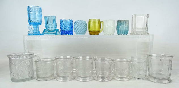 Toothpicker Holders: Lot (16) early glass toothpick holders and clear glass mugs with various motifs including Lincoln / Garfield, lamb etc..