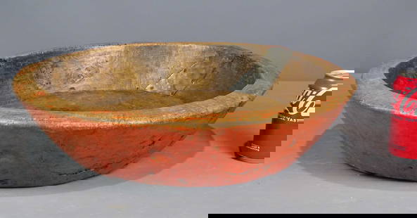 Primitive Carved Wooden Bowl: Primitive carved wooden bowl in vibrant paint surface. 18 1/2" D., 4 1/2" Ht..