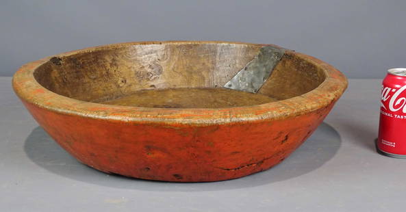 Primitive Carved Wooden Bowl: Primitive carved wooden bowl in vibrant paint surface. 18 1/2" D., 4 1/2" Ht..