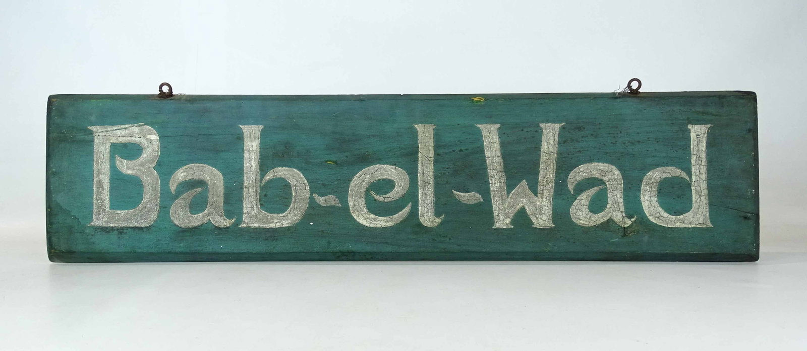 Trade Sign: Vintage wooden carved and painted trade sign "Bab-el-Wad". 8 1/2" x 35 1/2". Jewish Catskills Borscht Belt Resort era.