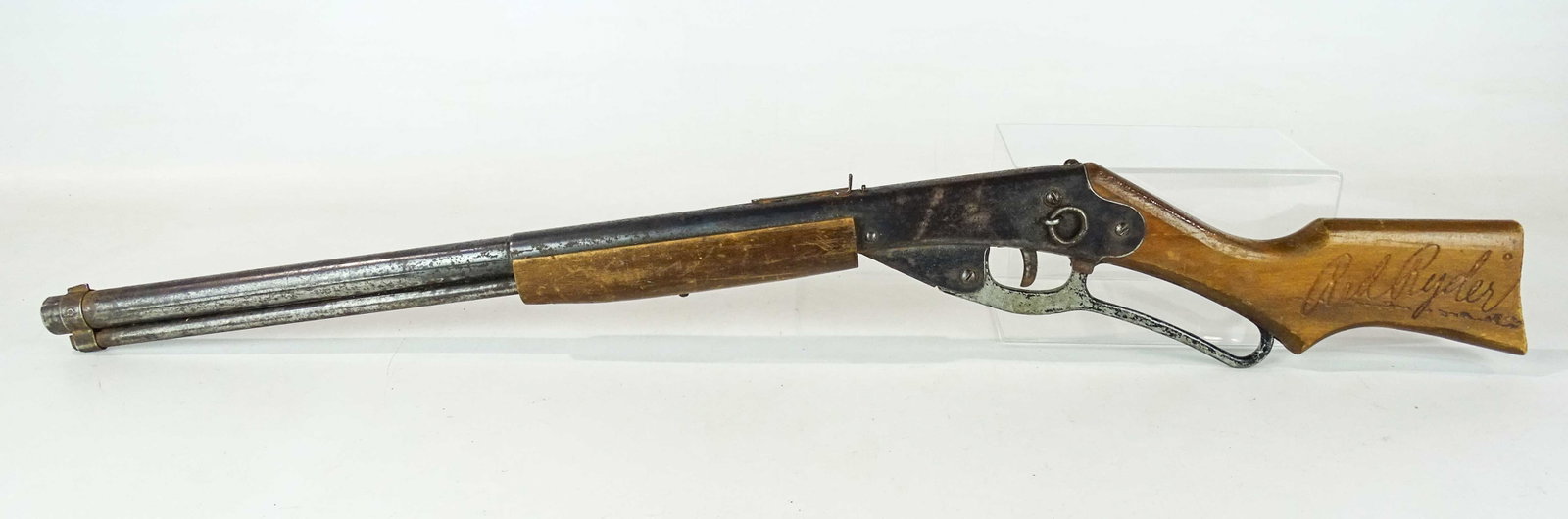 Red Ryder Pop Rifle: Vintage Red Ryder pop rifle. 33" L..