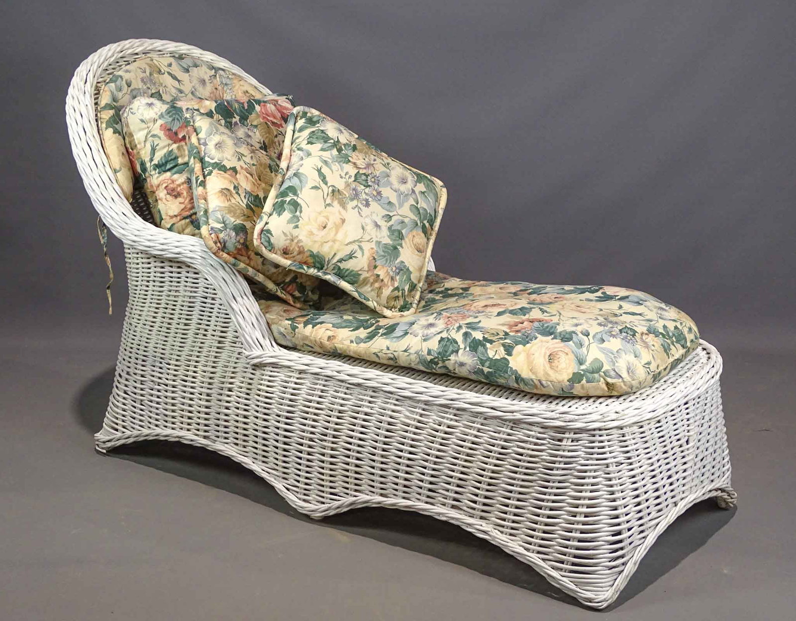 Wicker Chaise Lounge: Wicker chaise lounge. 60" L..