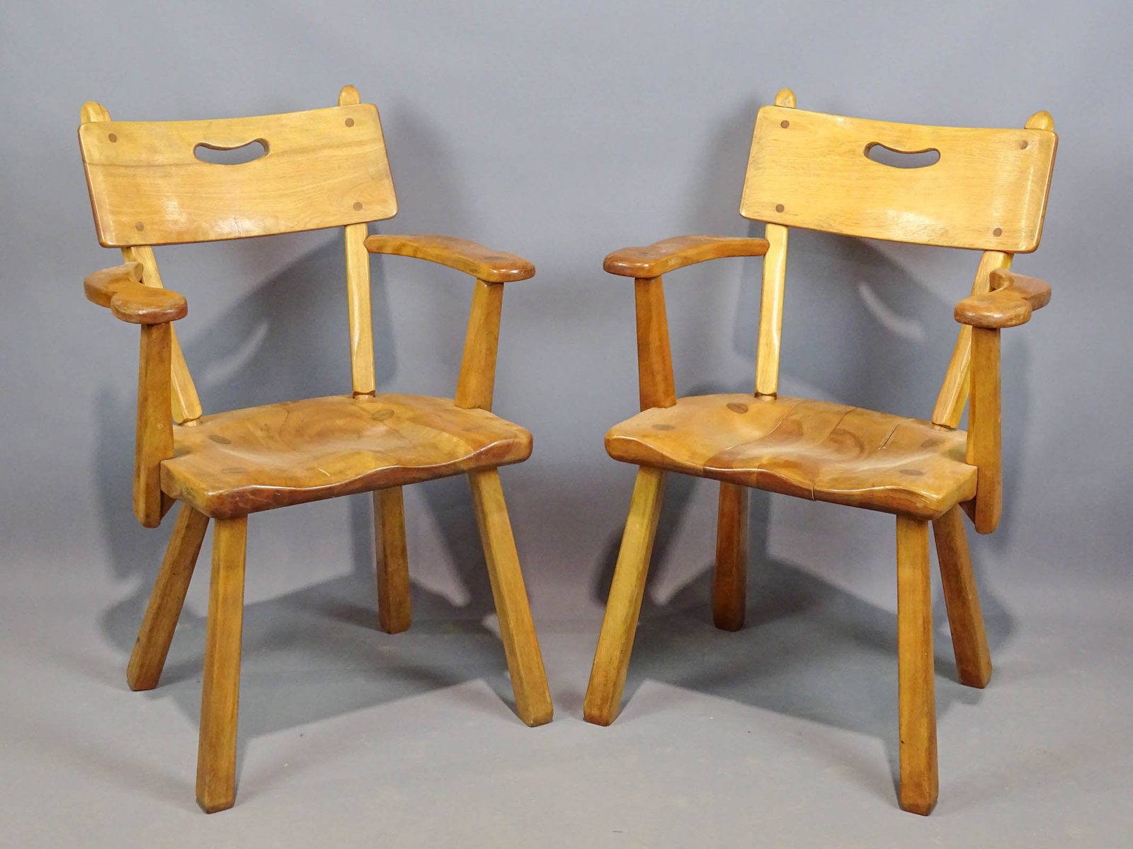 Pair of Cushman Armchairs: Pair of vintage Cushman armchairs. 18" seat Ht., 34 1/2" Ht.. One seat needs regluing.