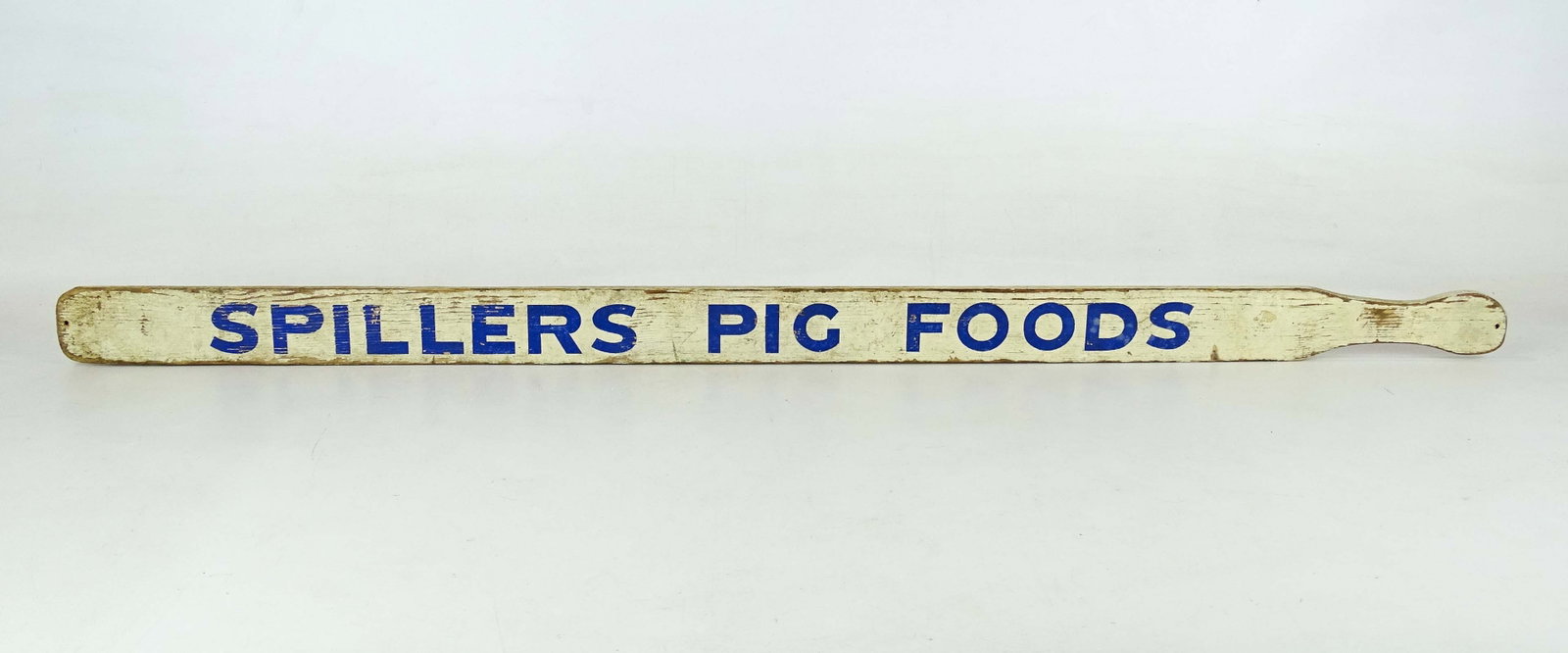 Trade Sign: Early painted wooden two sided trade sign "SPILLERS PIG FOODS". 33 1/2" x 2".