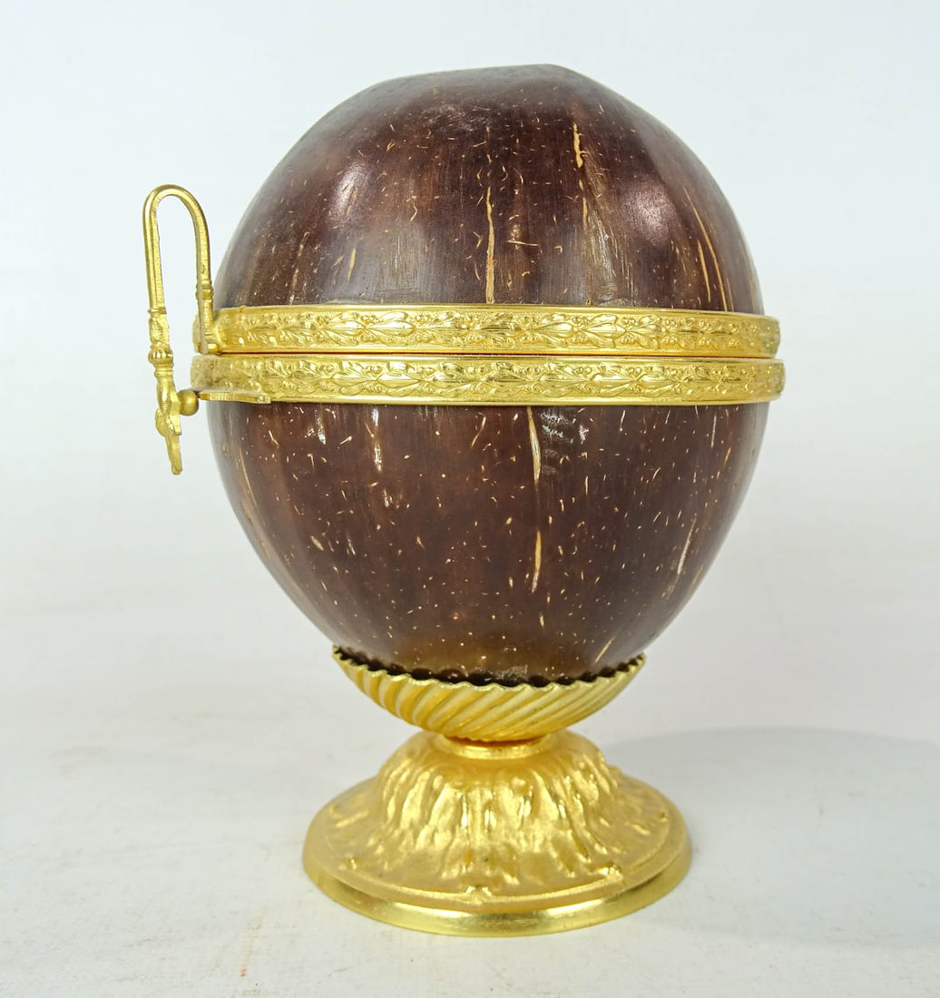 French Gilded Coconut Caddy: French gilded Coconut caddy. 5 1/2" Ht.. Provenance: The Edward Herrmann Estate, Salisbury Connecticut.