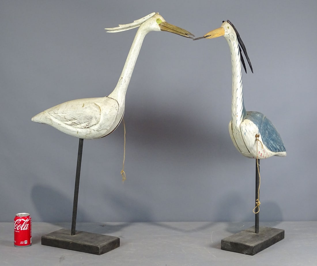 Pair of Folk Art Wooden Carved Birds: Pair of folk art wooden painted and carved birds. Heads remove. 29" L., 34" Ht..