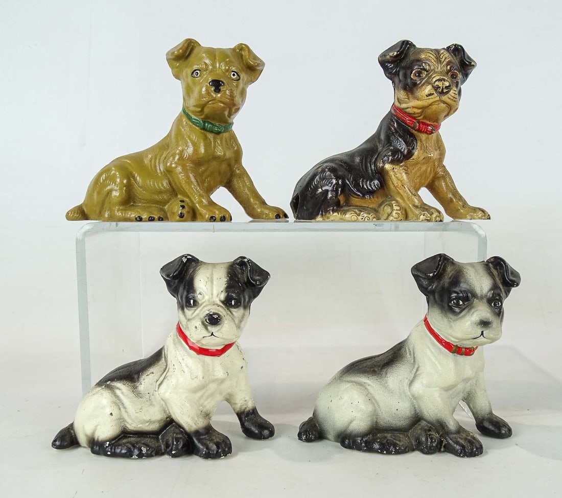 Dog Bank Lot: Lot (4) cast iron dog banks. Tallest 4 1/2" Ht..