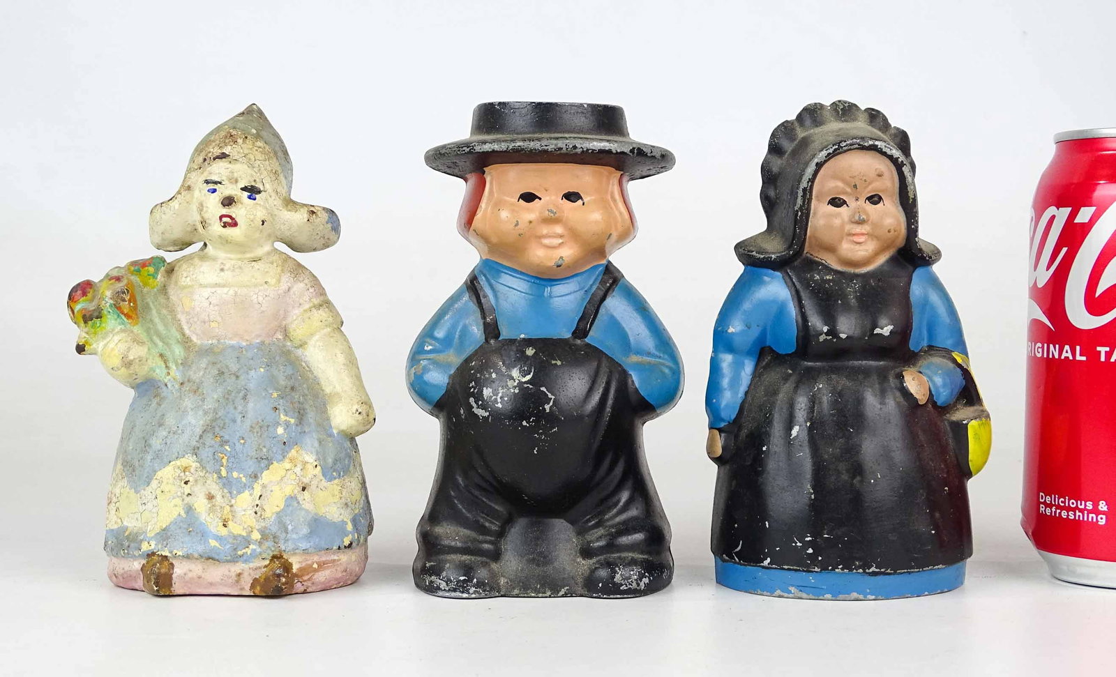 Bank Lot: Lot (3) cast iron Amish banks. Tallest 5 1/2" Ht..