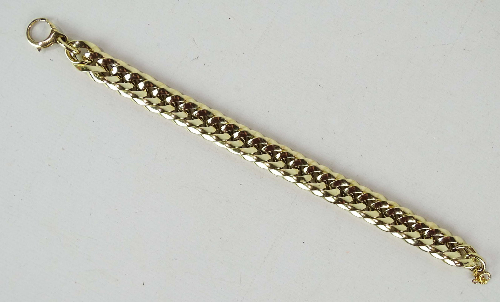 14 Karat Gold Plated Bracelet: 14 karat gold plated bracelet.
