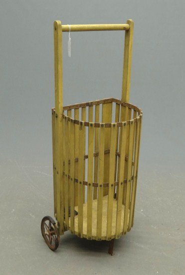 Pull Cart: Early pull cart in old yellow paint. 40 1/2" Ht.
