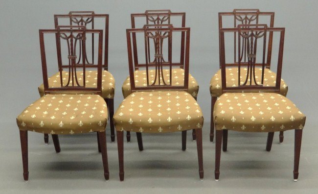 Set Of Hepplewhite Style Chairs: Set of six Hepplewhite style carved back tapered leg mahogany chairs. 18" Seat Ht. 36" Overall Ht.