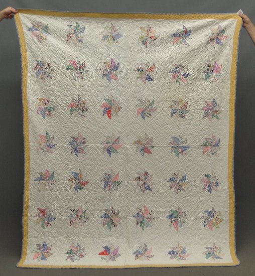 Quilt: C. 1930's pinwheel quilt. 70" x 86 1/2". Documented through the New Hampshire Quilt Documentation Project Phase II.