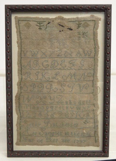 19th c. Sampler: 19th c. needlework sampler having alphabet and name 'Betsy Batchelder...1797". Sight 12" x 8".