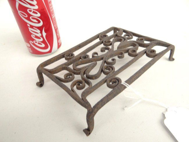 Iron Trivet: Fancy iron trivet. 5" x 6 1/2".