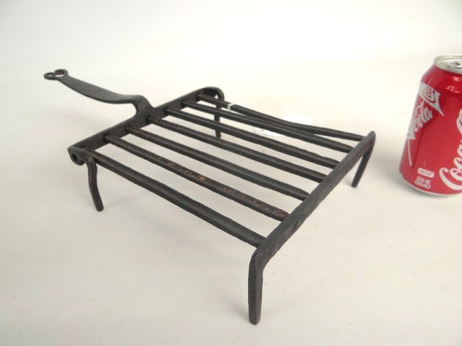 18th c. Broiler: 18th c. stationary broiler with heart handle. 16" Length.