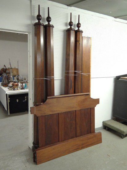 Bed: Mahogany four poster bed.