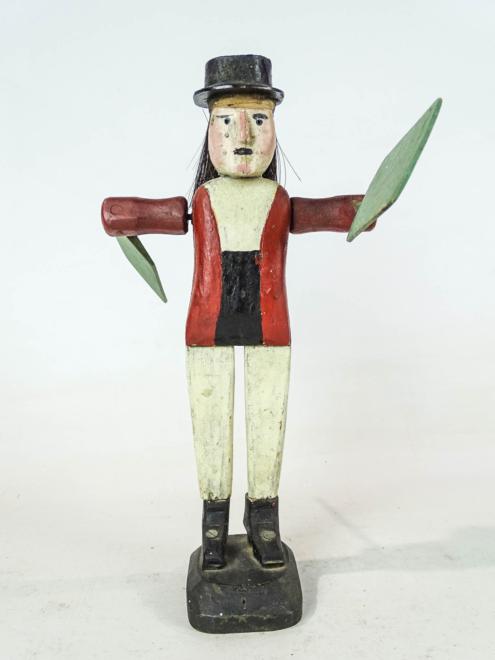 Folk Art Whirligig: Folk art wooden polychrome painted whirligig. Figure with hat. Signed and dated 1919 underside. 12 1/2" Ht.. Provenance: Ed and Anita Holden Collection.