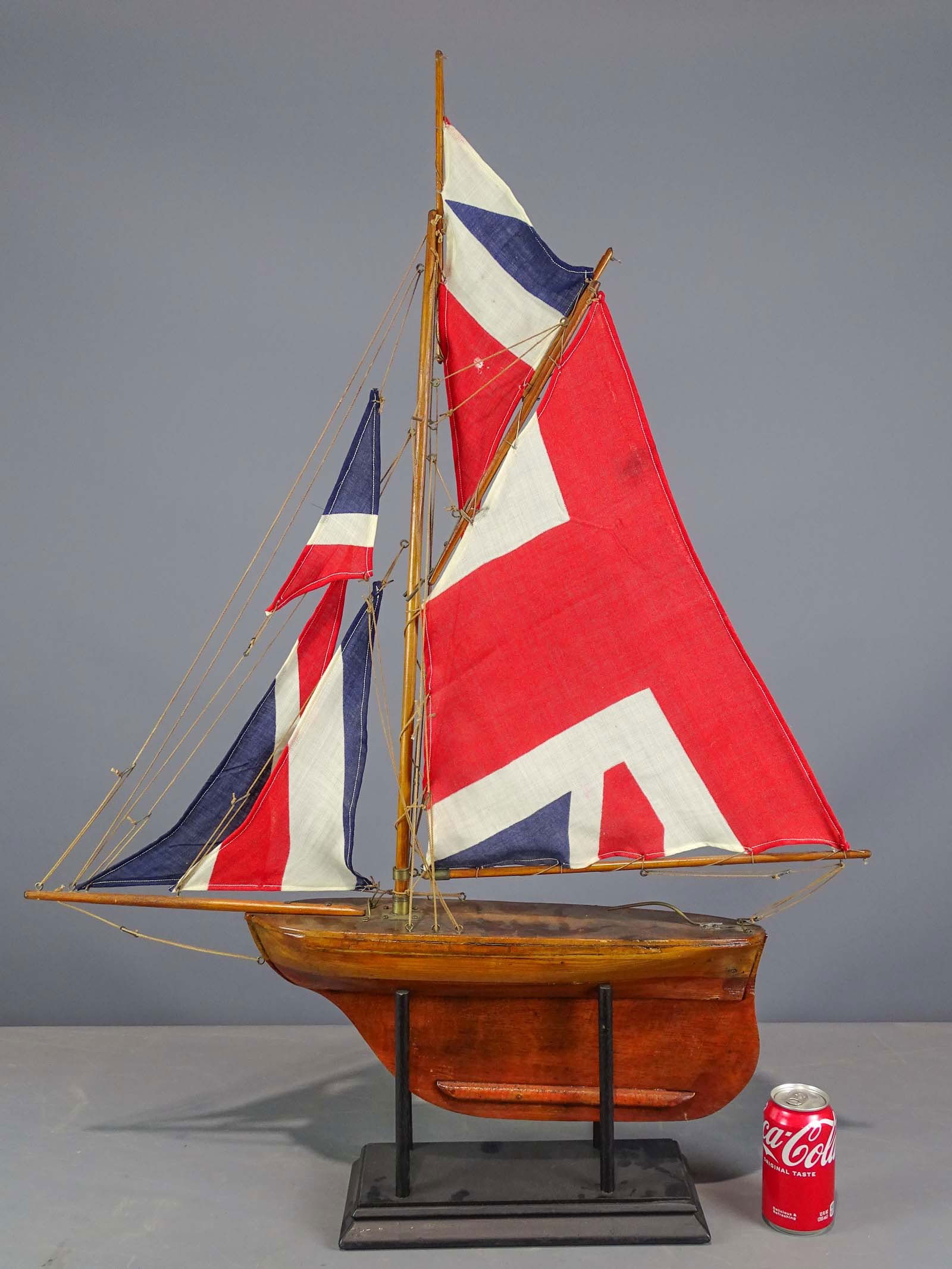 Ship Model: Early wooden ship model. Custom base. 31" L., 38" Ht.. Provenance: Ed and Anita Holden Collection.