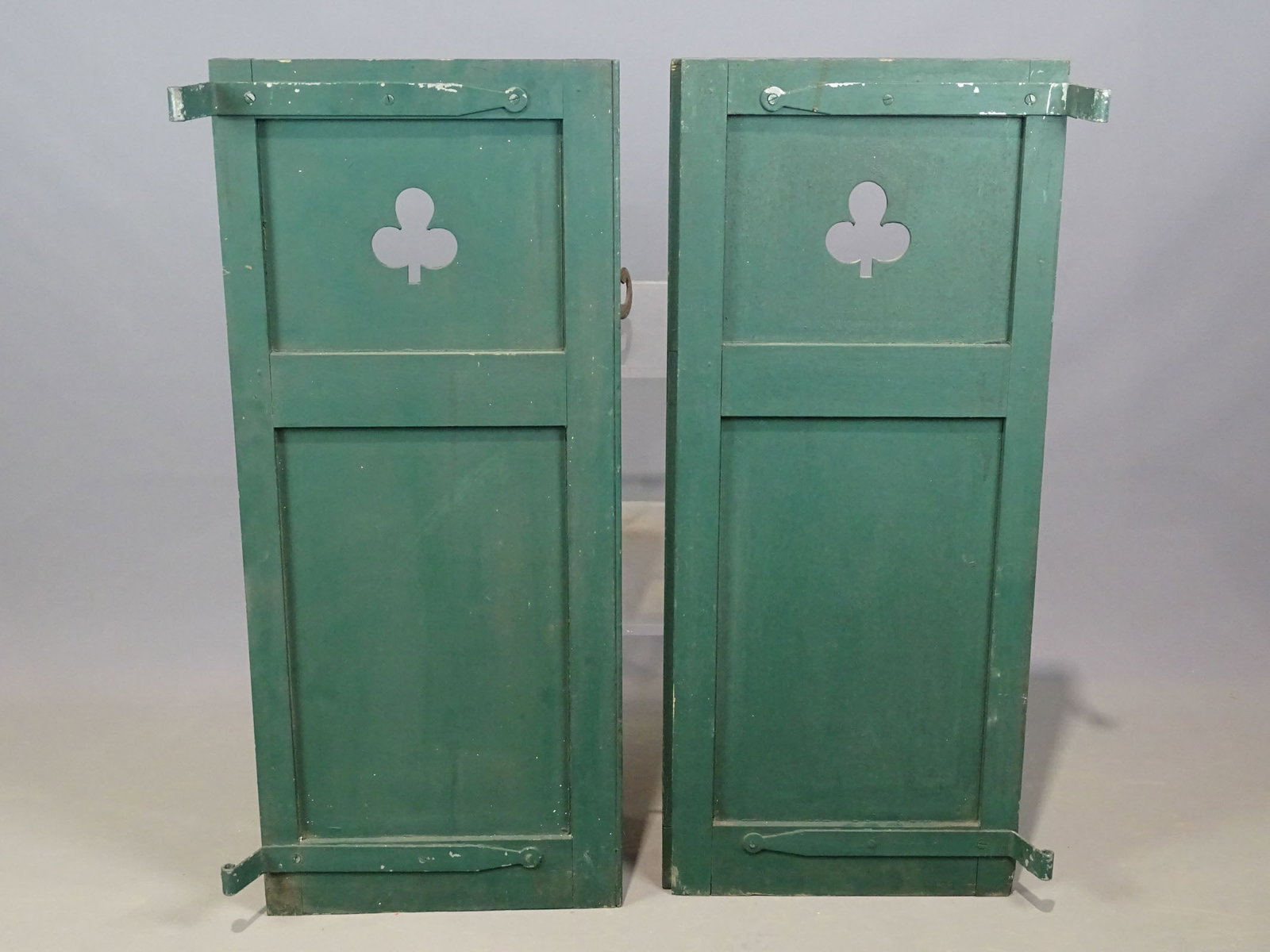 Pair Shutters: Pair of early wooden shutters in green paint. 36 3/4" x 15 1/2".
