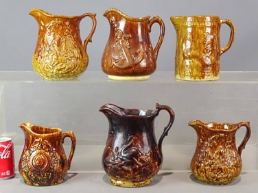 Rockingham Glaze Pitchers