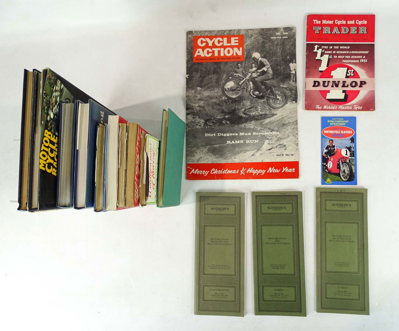 Motorcycle Racing Books: Misc. collection of motorcycle racing books. (3) Sotheyby's 1987-88 catalogs, (11) books.