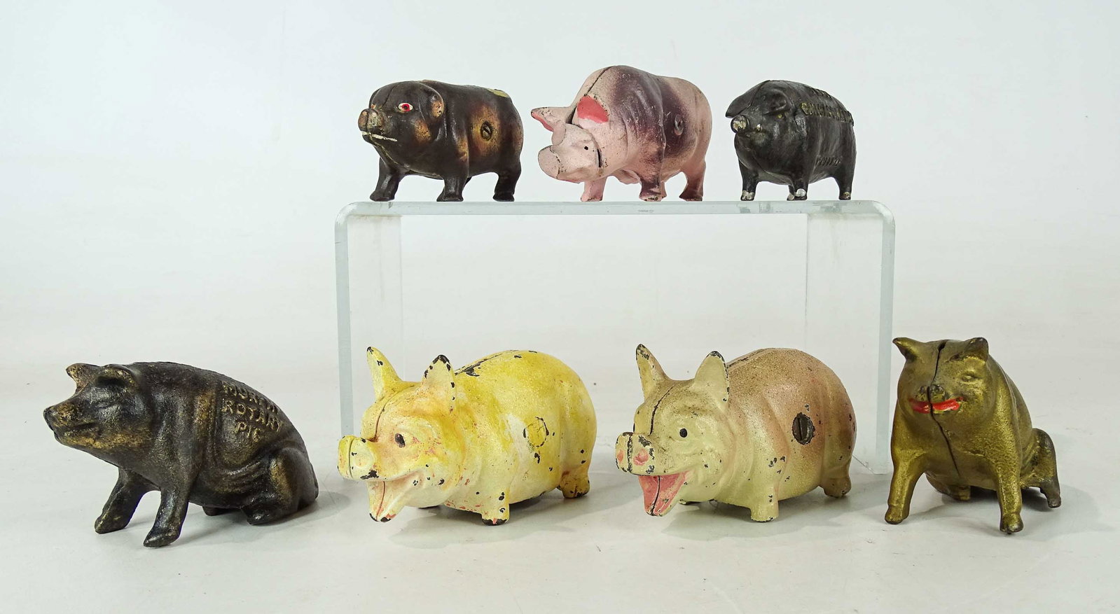 Bank Lot: Pig still bank lot including "1902, I Made Chicago Famous", "Murphy Rotary Pig", (5) painted examples. (7) pieces.