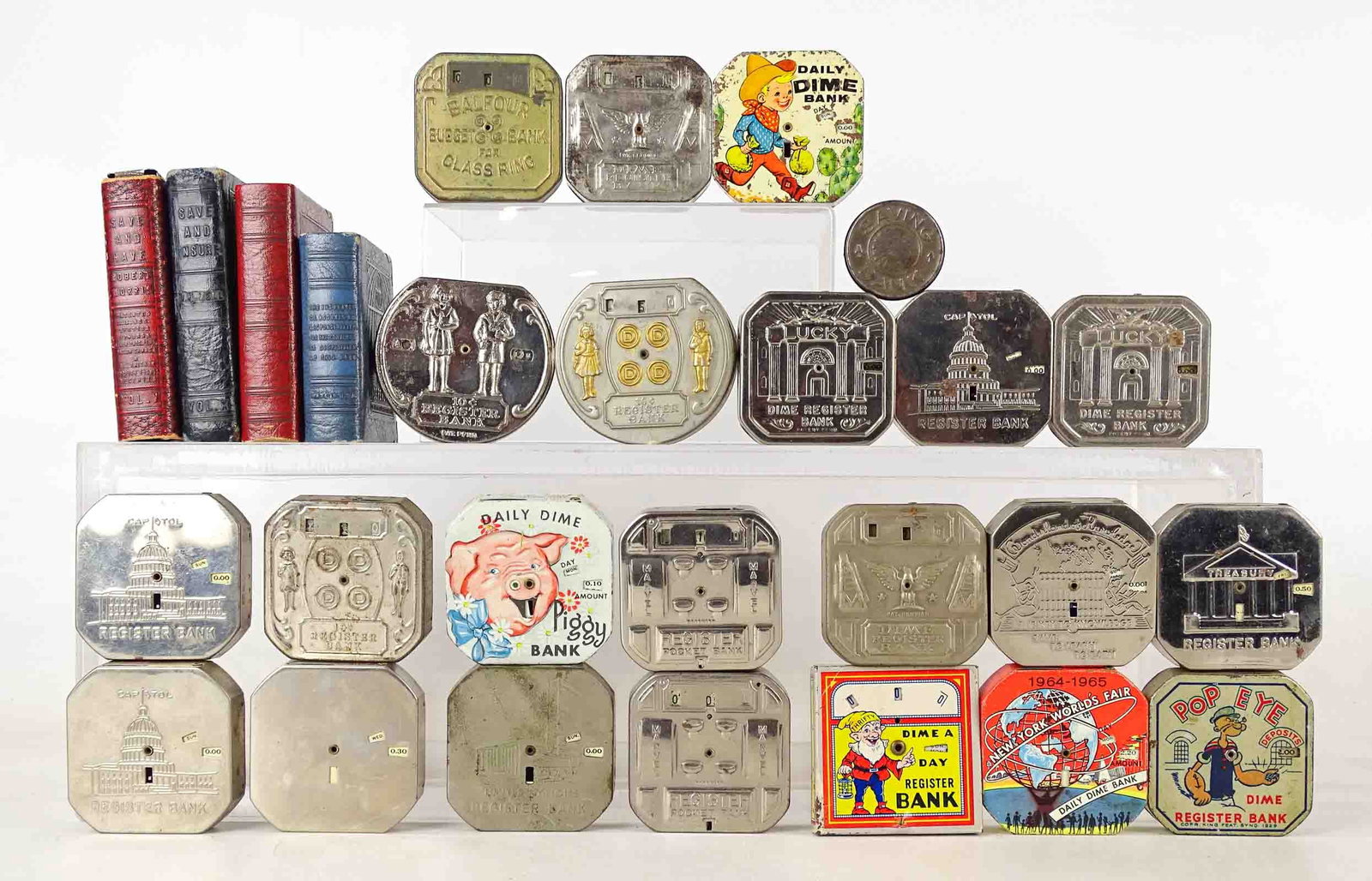 Bank Lot: Advertising still bank lot including (4) Book examples, (22) "Daily Dime" and other examples including 1964 World's Fair, "Piggy", Popeye, "Lucky", "Thrifty", "Capital", "United Nations", "Marvel" and