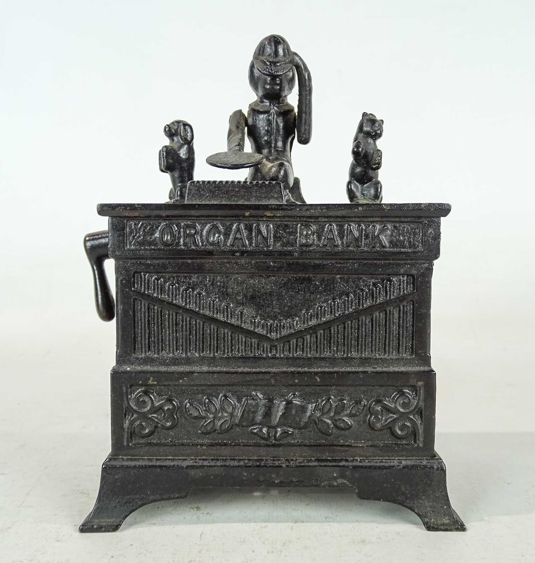 Organ Grinder Mechanical Bank: Organ Grinder cast iron mechanical bank.