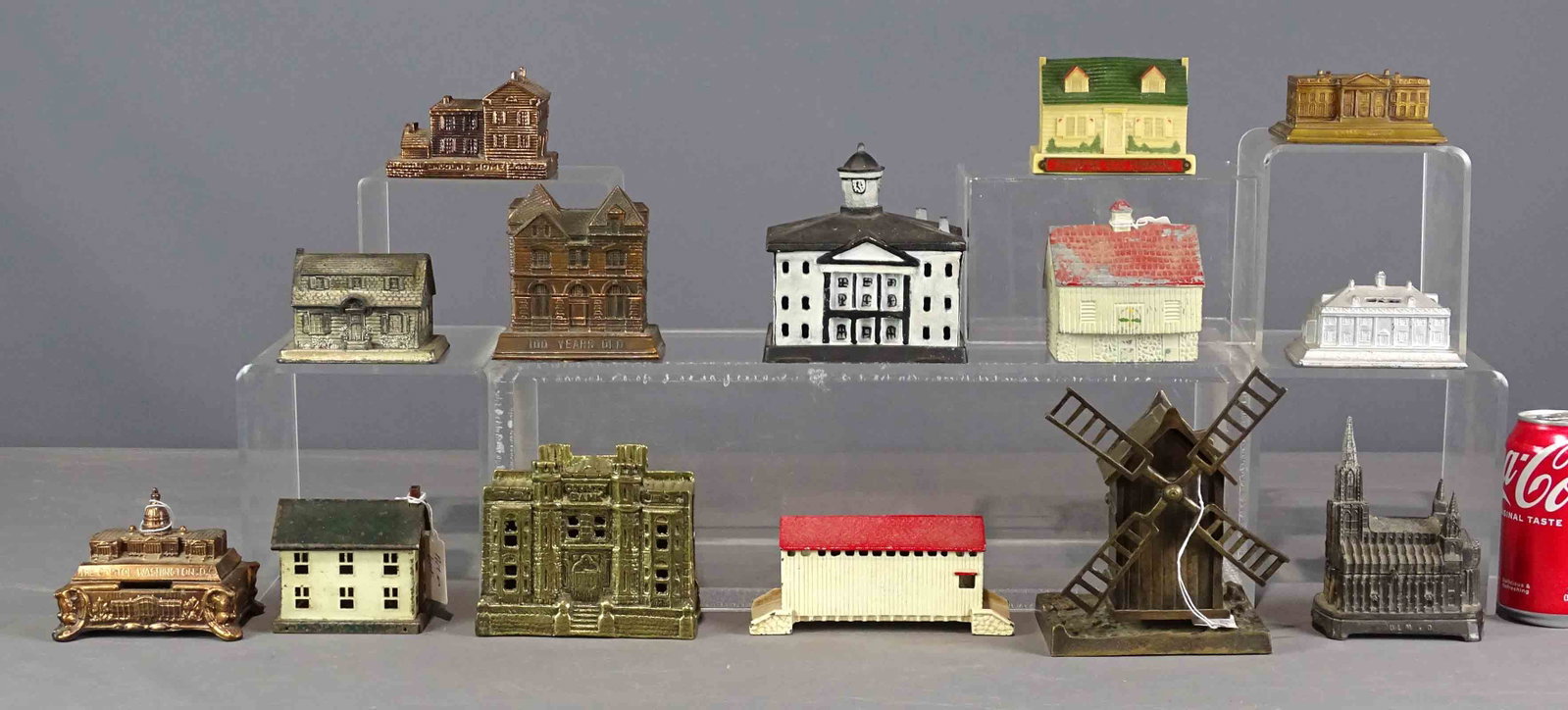 Bank Lot: Lot of various building banks including cast iron, tin, brass etc..